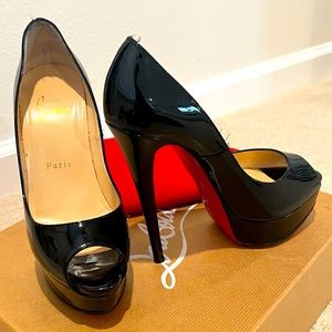 Christian Louboutin size 61/2, black.